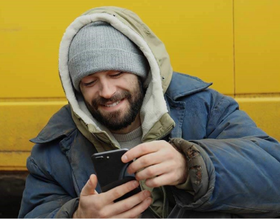 Picture of a person looking at a phone